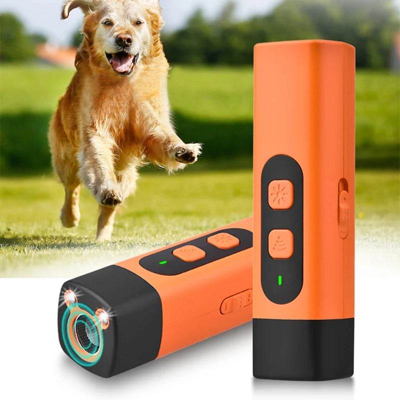 Orange Bark Eliminator device with control buttons and LED lights, designed for humane dog bark training, shown outdoors with a happy golden retriever running in the background.
